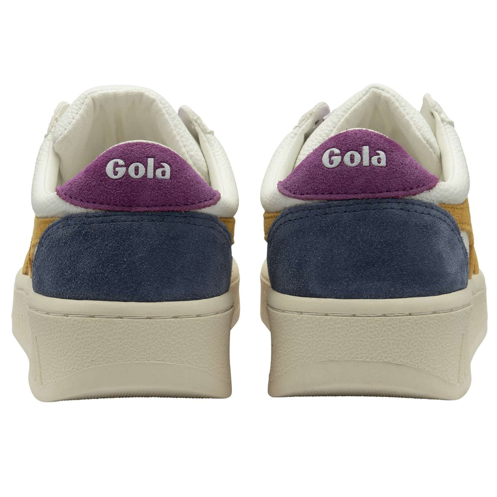 Pair of Gola trainers, rear view, with purple, blue, and yellow panels and Gola logo on the heel on a white background