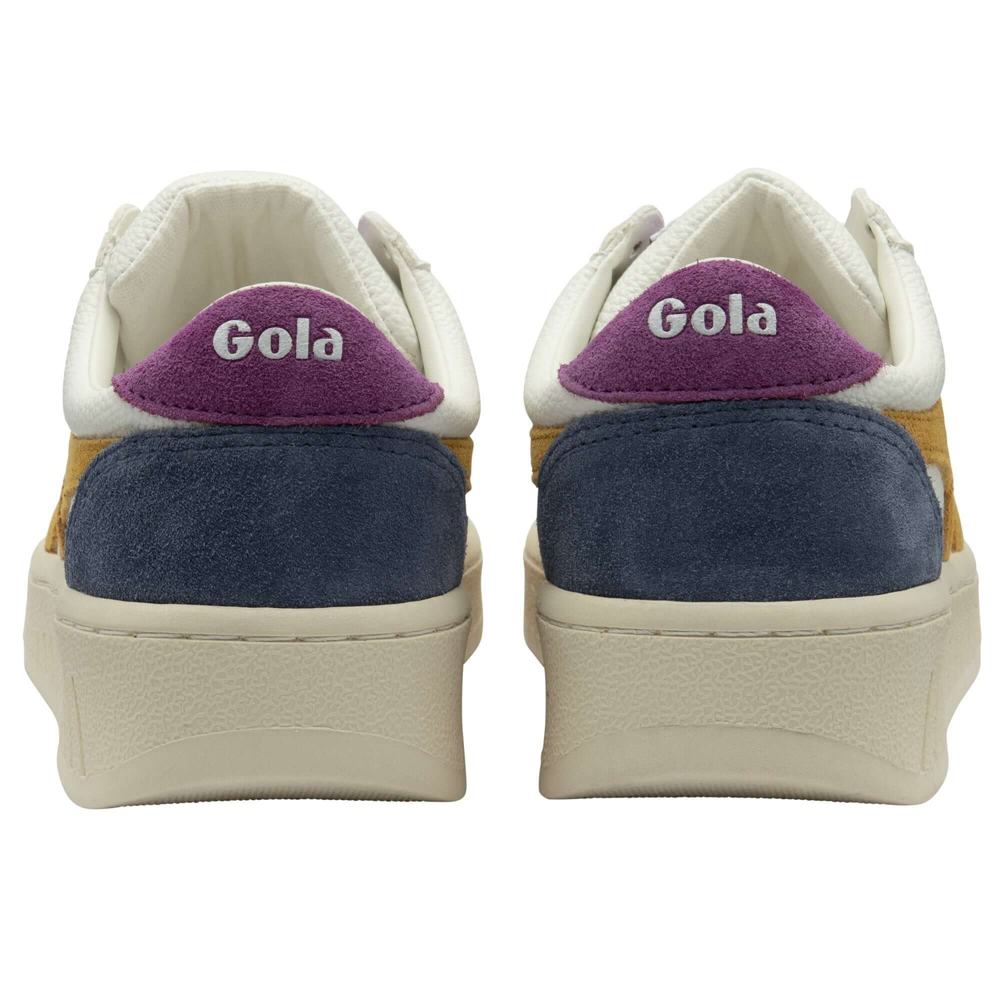 Pair of Gola trainers, rear view, with purple, blue, and yellow panels and Gola logo on the heel on a white background