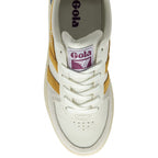 White Gola trainers with yellow side stripes on a white background