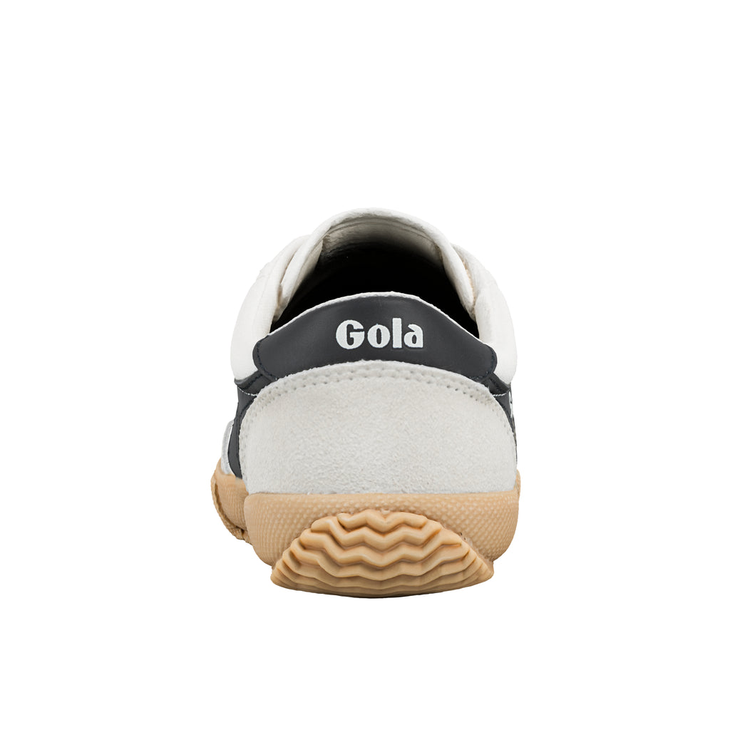 Rear view of a white and navy Gola trainer with a gum rubber sole