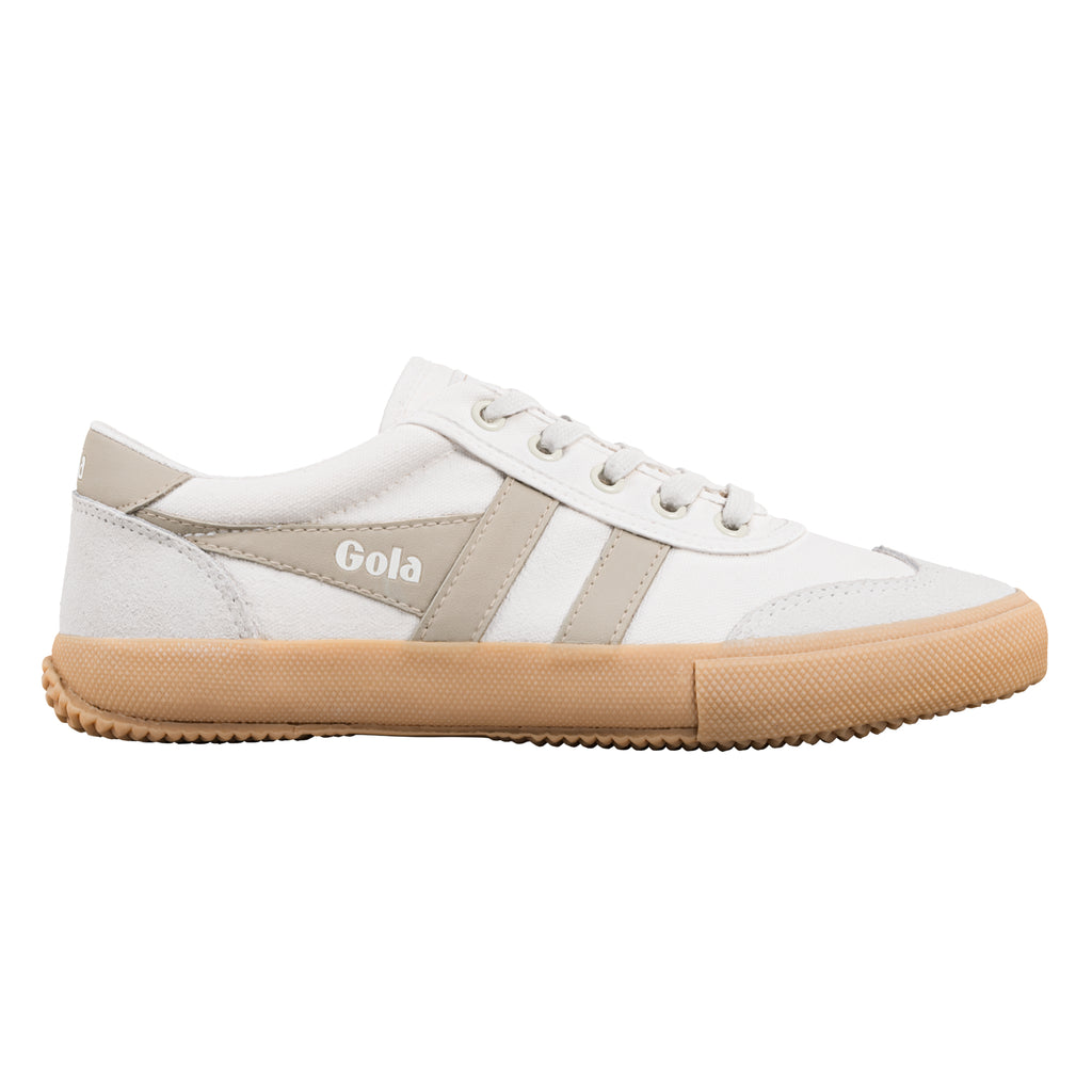 White canvas Gola trainer with beige suede detailing and a gum rubber sole