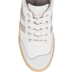 Top view of a white Gola trainer with beige side stripes and a gum sole