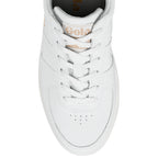 Top view of a white Gola trainer with lace up fastening