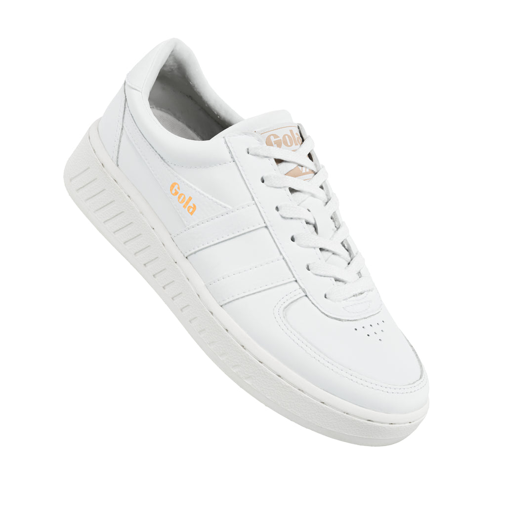 White Gola trainer with gold branding