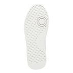 White trainer sole with a textured diamond pattern and circular pivot point