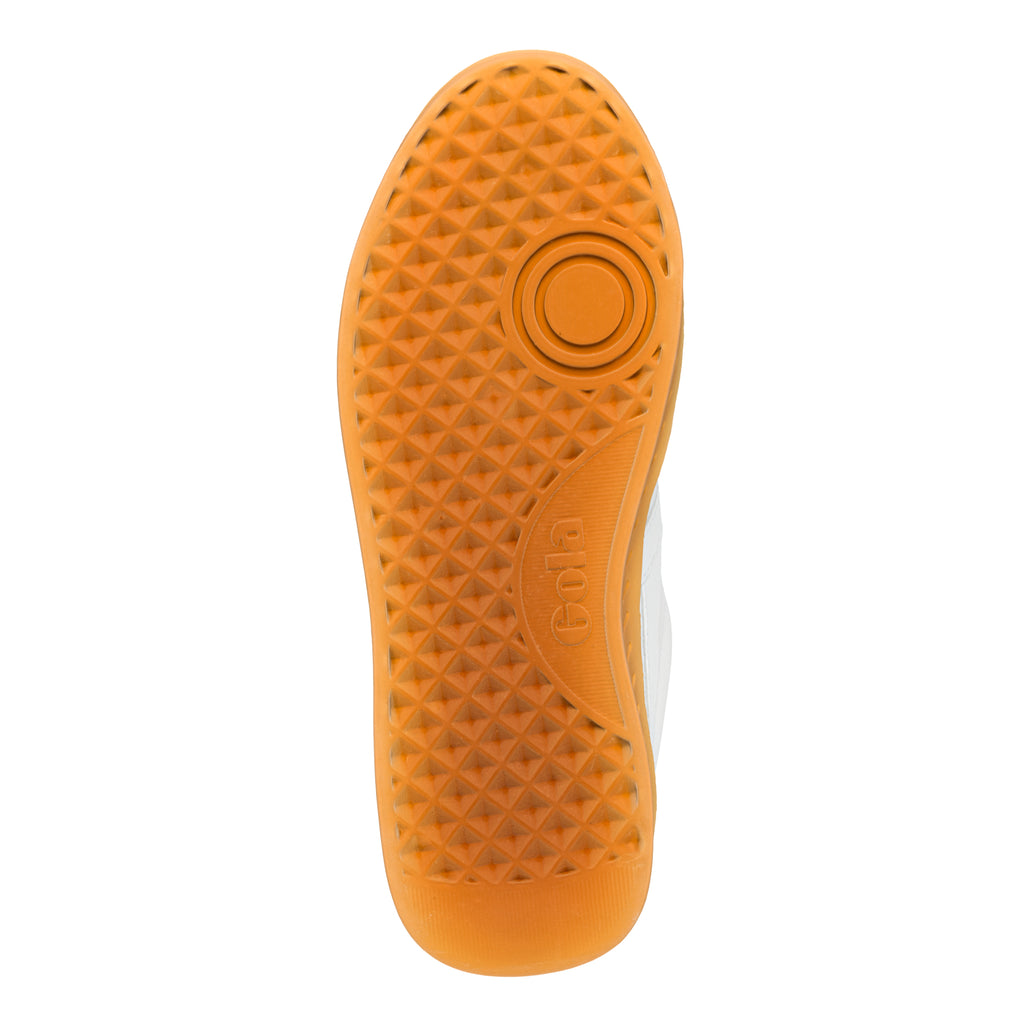 Orange gum rubber trainer sole with a textured diamond pattern and Gola branding