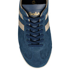 Top view of a navy blue suede Gola Bullet trainer with gold side stripes and matching laces