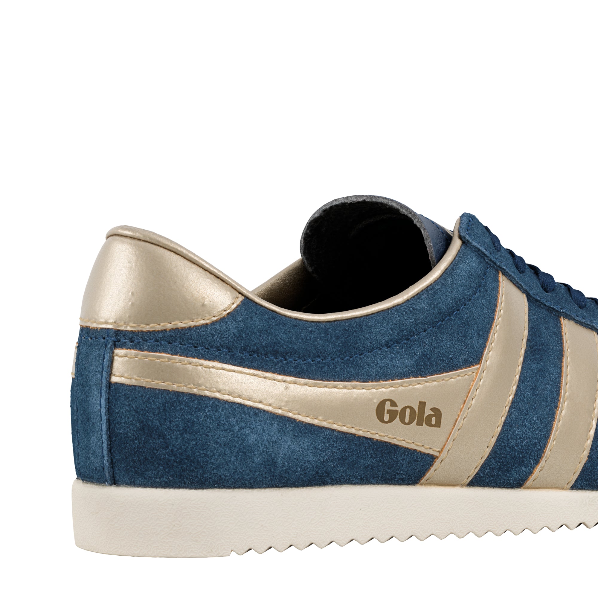 Close up of a blue suede Gola trainer with metallic gold side stripes and heel tab