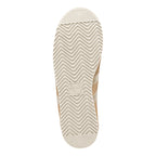 Cream coloured trainer sole with a chevron tread pattern and Gola logo