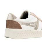 Close up of the heel and side of a white Gola trainer with metallic gold and brown suede detailing