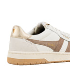 Close up of a white Gola trainer with metallic gold heel tab and beige suede side panel
