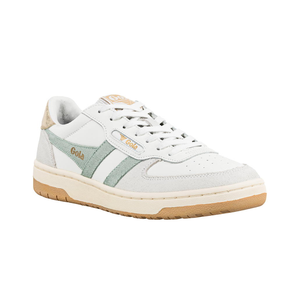 White Gola trainer with sage green suede side panels and a gum rubber sole