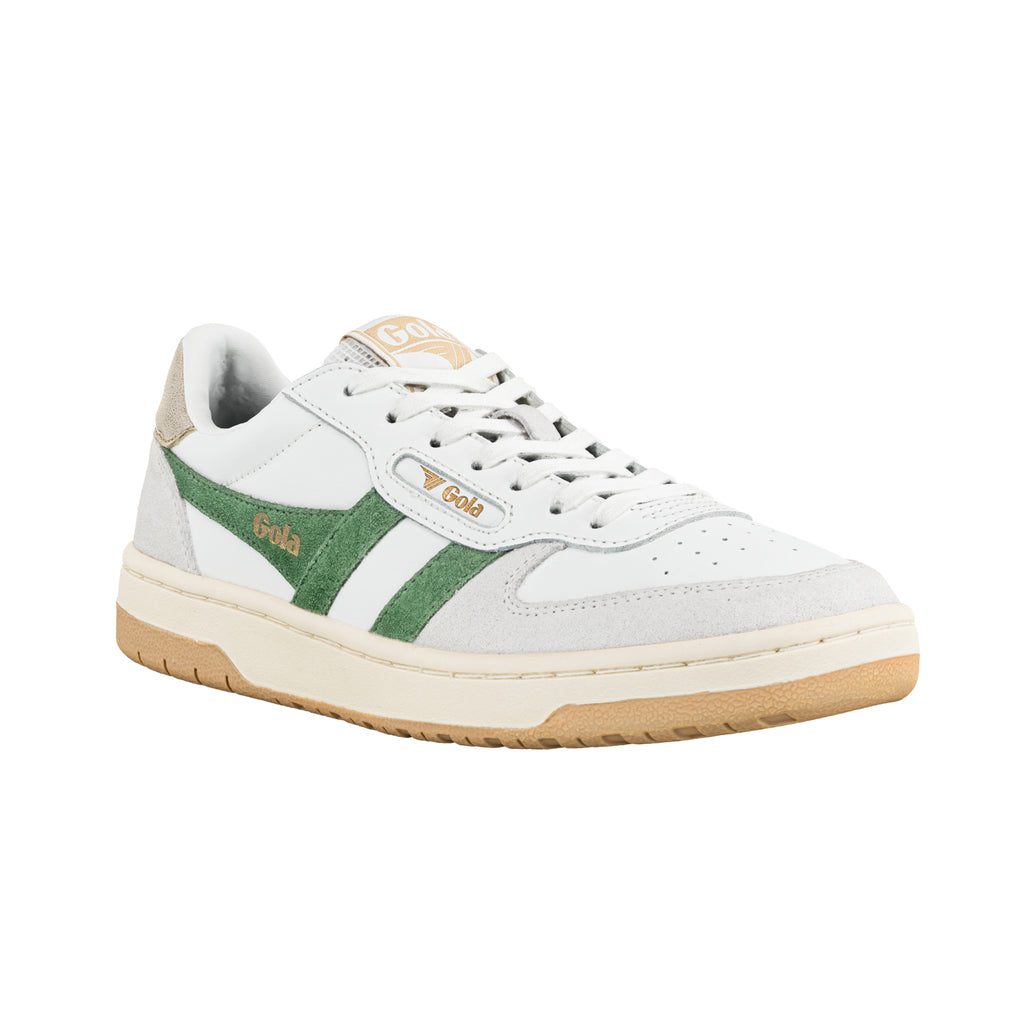 White Gola trainer with green suede side stripes and gum sole