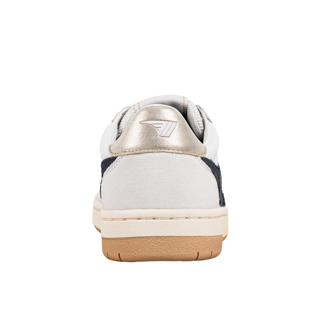 Rear view of a white and navy trainer with a metallic heel tab and gum rubber sole