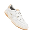 White Gola trainer with gold accents and a gum sole