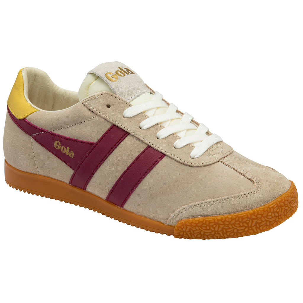 Beige trainer with maroon stripe and yellow accents on a white background