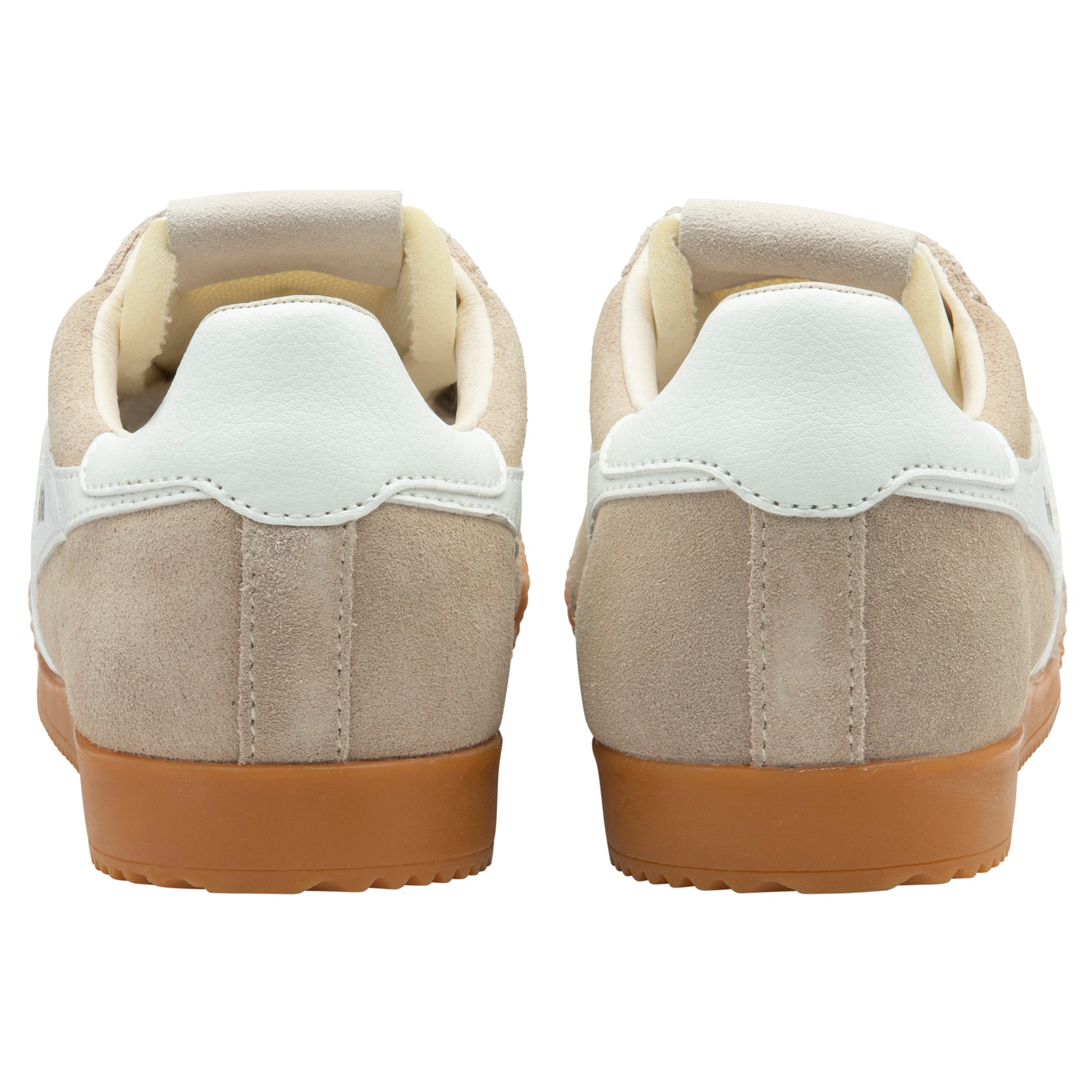 Pair of beige trainers with white soles on a white background