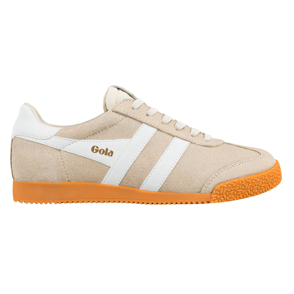 Beige suede Gola trainer with white side stripes and orange textured rubber sole