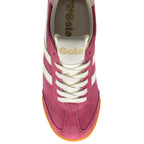 Maroon trainer with white laces and sole on a white background