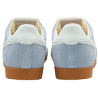 Pair of light blue trainers with gum soles on a white background