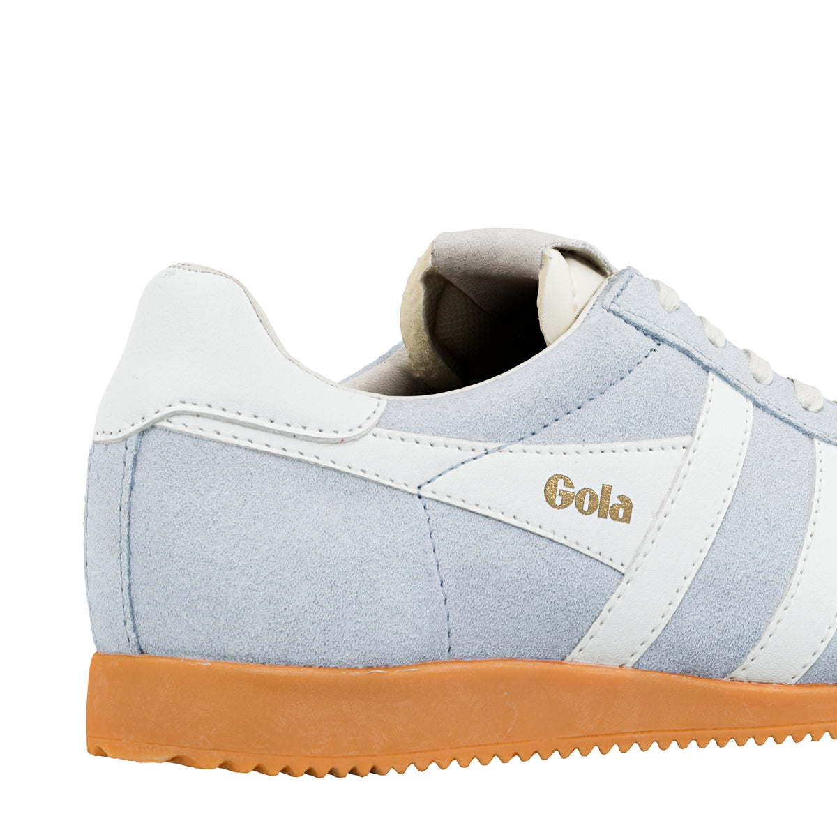 Heel and side detail of a light blue suede Gola Classics trainer with white trim and a gum sole