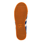 Orange rubber trainer sole with chevron tread pattern and Gola logo