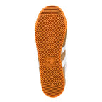 Orange rubber trainer sole with chevron tread pattern and Gola logo