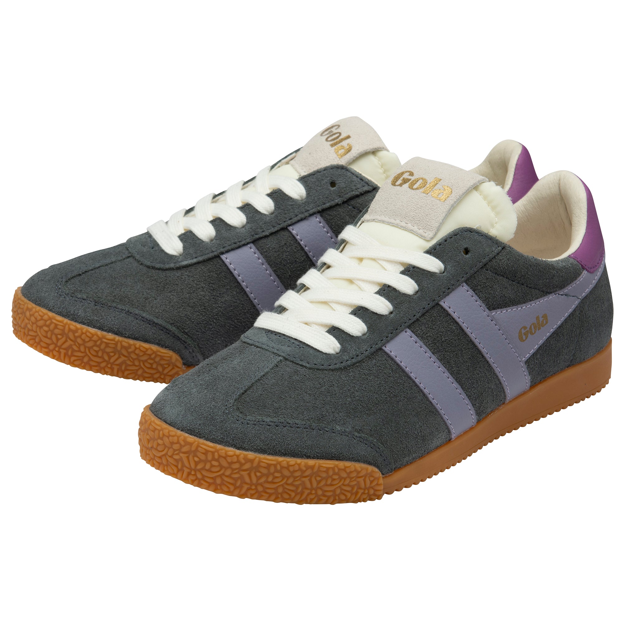 Pair of grey trainers with purple heel tab and white laces on a white background