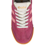 Top view of a pink suede Gola trainer with white laces and a gum sole