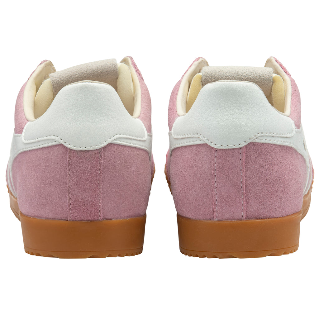 Pair of pink trainers with white soles and brown soles on a white background
