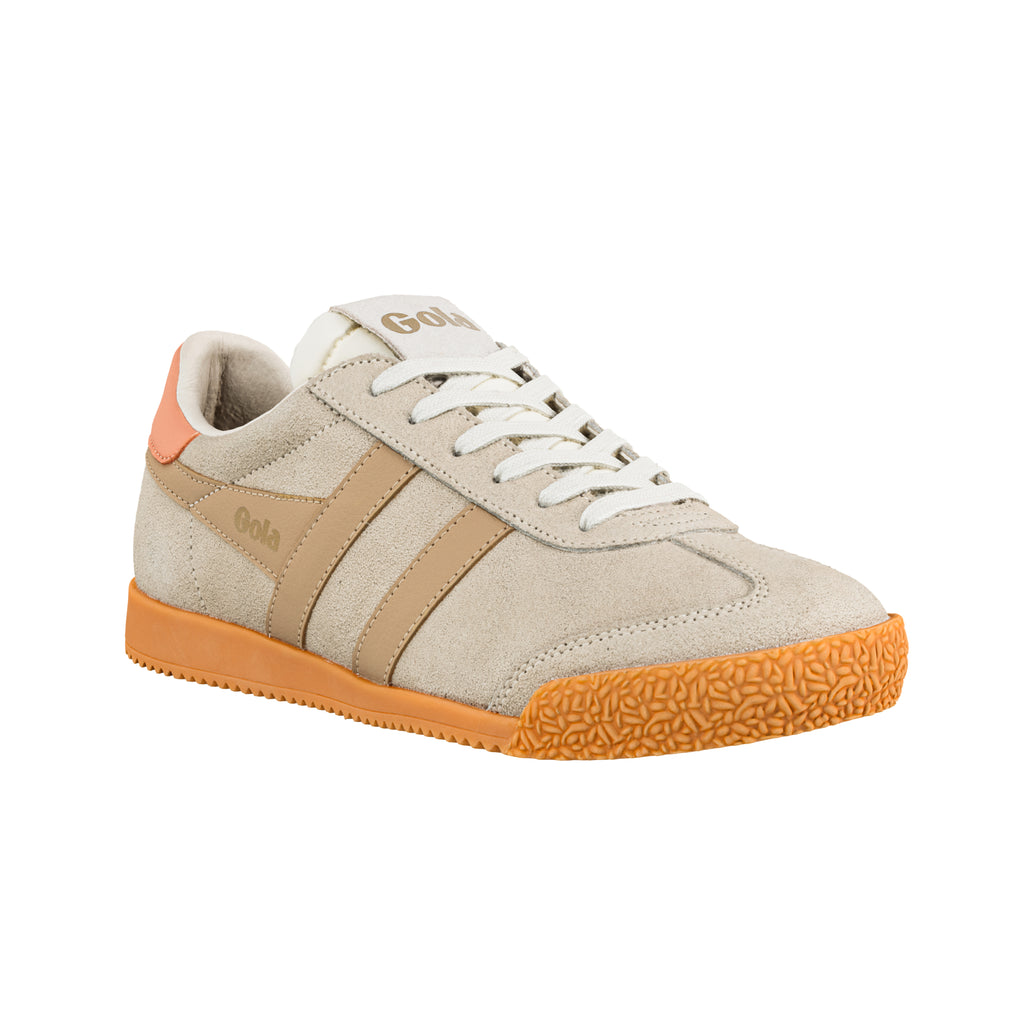 Beige suede Gola trainer with white laces and orange textured rubber sole