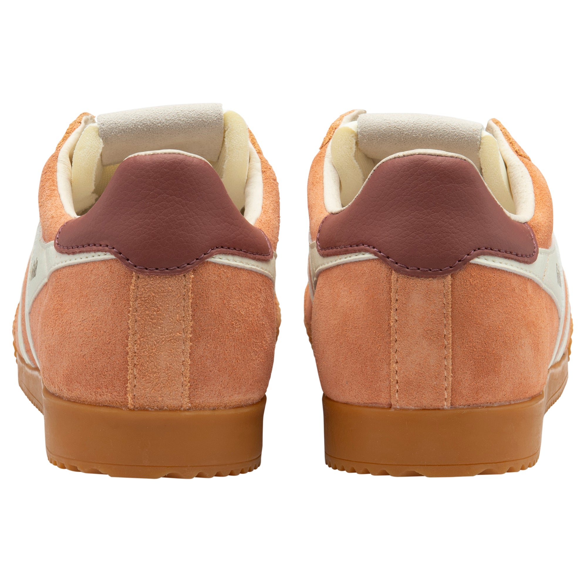 Brown and beige trainers with a gum sole on a white background