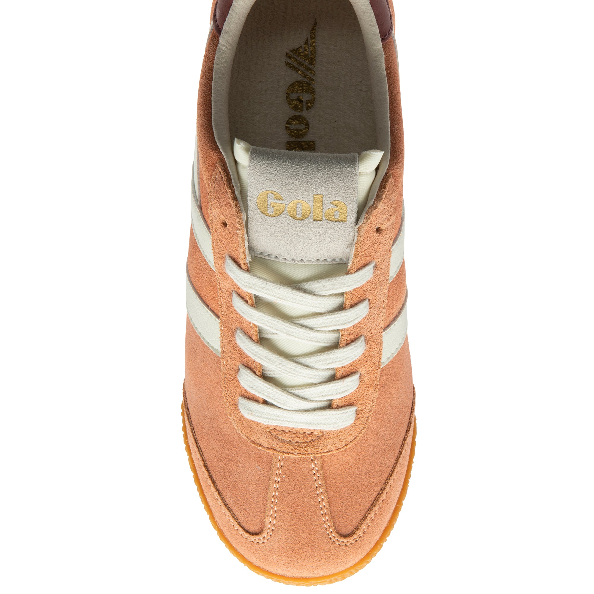 Tan trainer with white laces on a white background