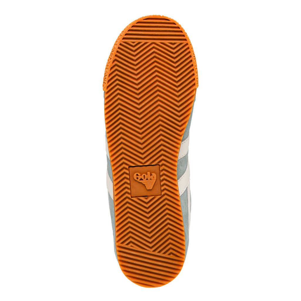 Orange rubber trainer sole with chevron tread pattern and Gola logo