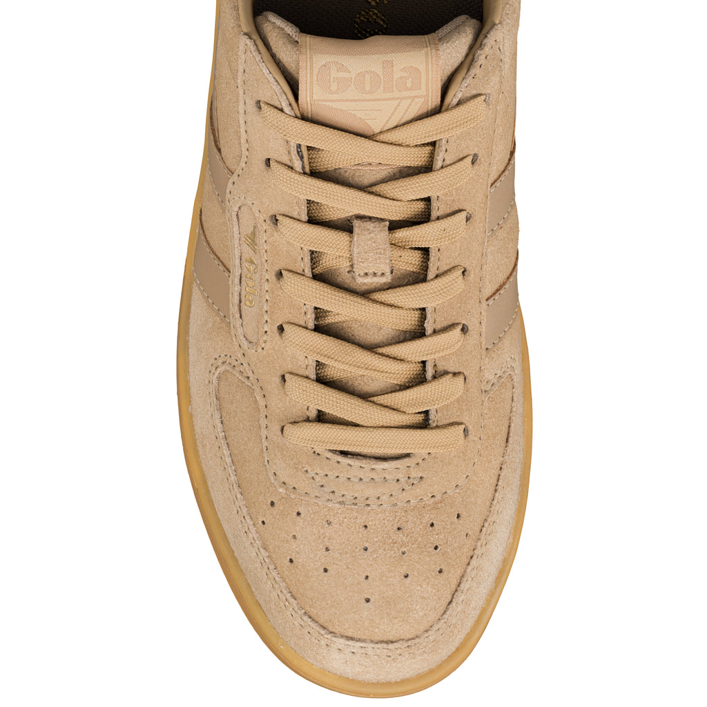 Top view of a beige suede Gola trainer with matching laces and a gum sole