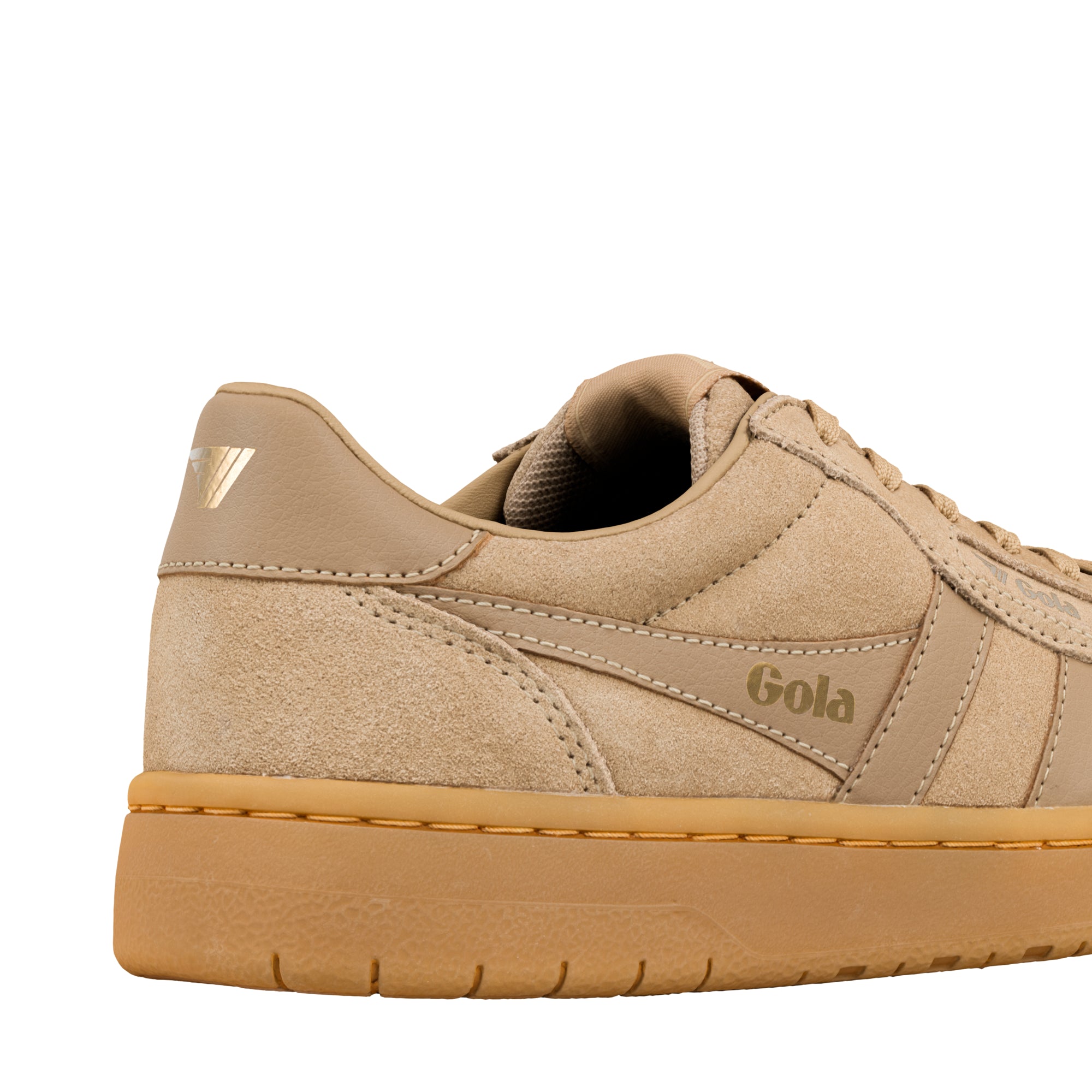 Close up of the heel and side of a beige suede Gola trainer with a gum rubber sole