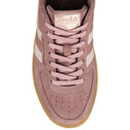 Top view of a dusty pink suede Gola trainer with a gum sole and matching laces