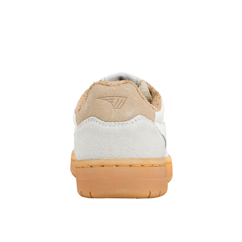 Rear view of a white and beige trainer with a gum sole