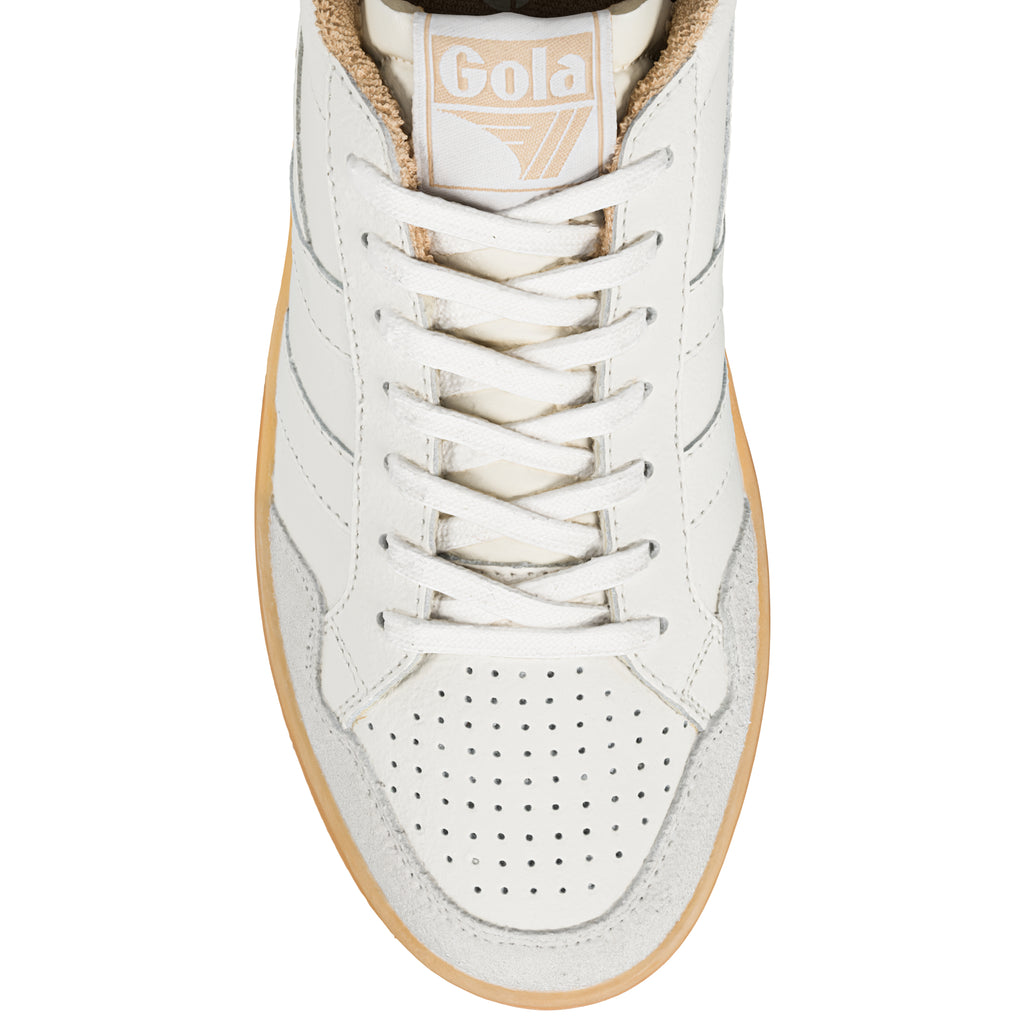 Close-up of a white Gola trainer with beige accents and a gum sole