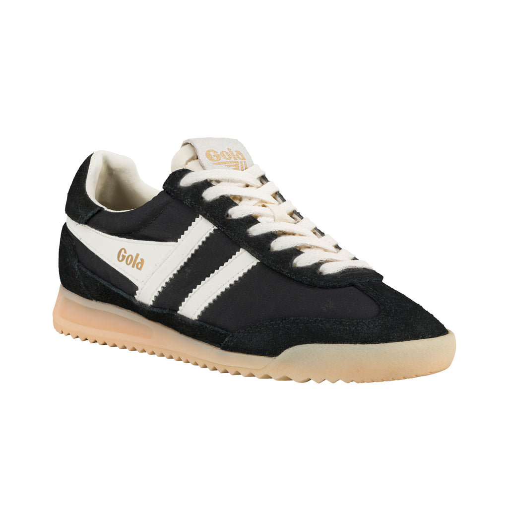 Black and white Gola trainer with a beige sole and laces