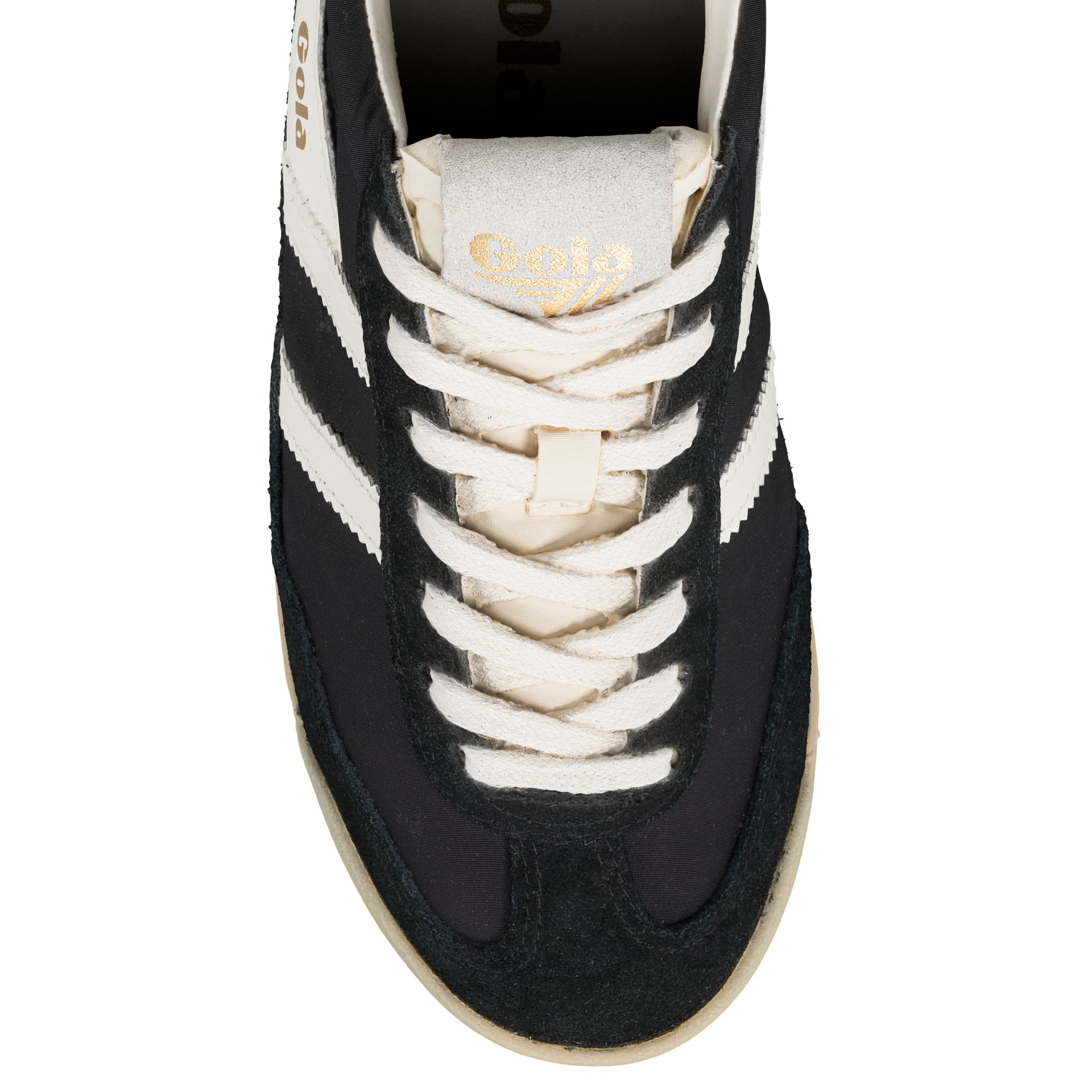 Close-up of a black Gola trainer with white stripes and cream laces
