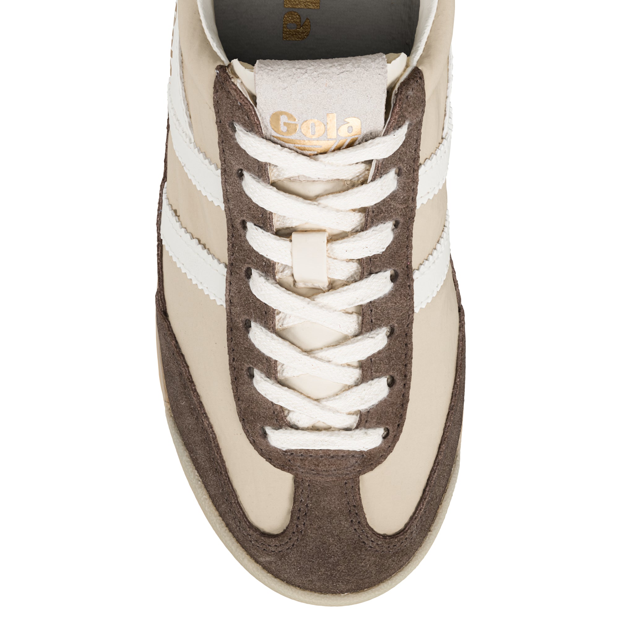 Top-down view of a Gola Harrier trainer in beige and brown with white laces and side stripes
