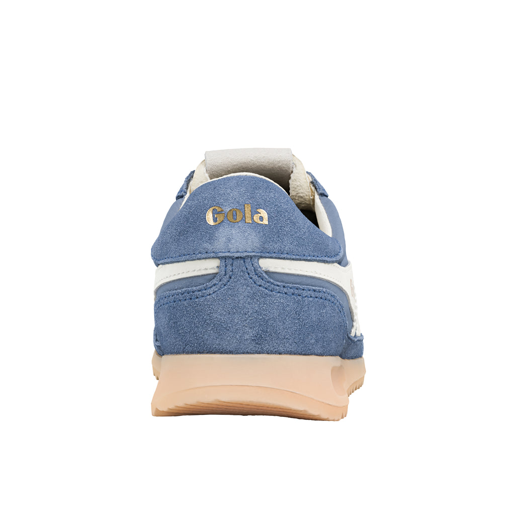 Rear view of a blue suede Gola trainer with a cream sole and white trim