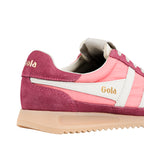Close up of the heel of a Gola trainer in pink and burgundy with a cream sole
