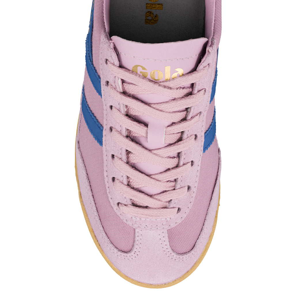 Top view of a pink suede and canvas trainer with blue side stripes and a gum sole