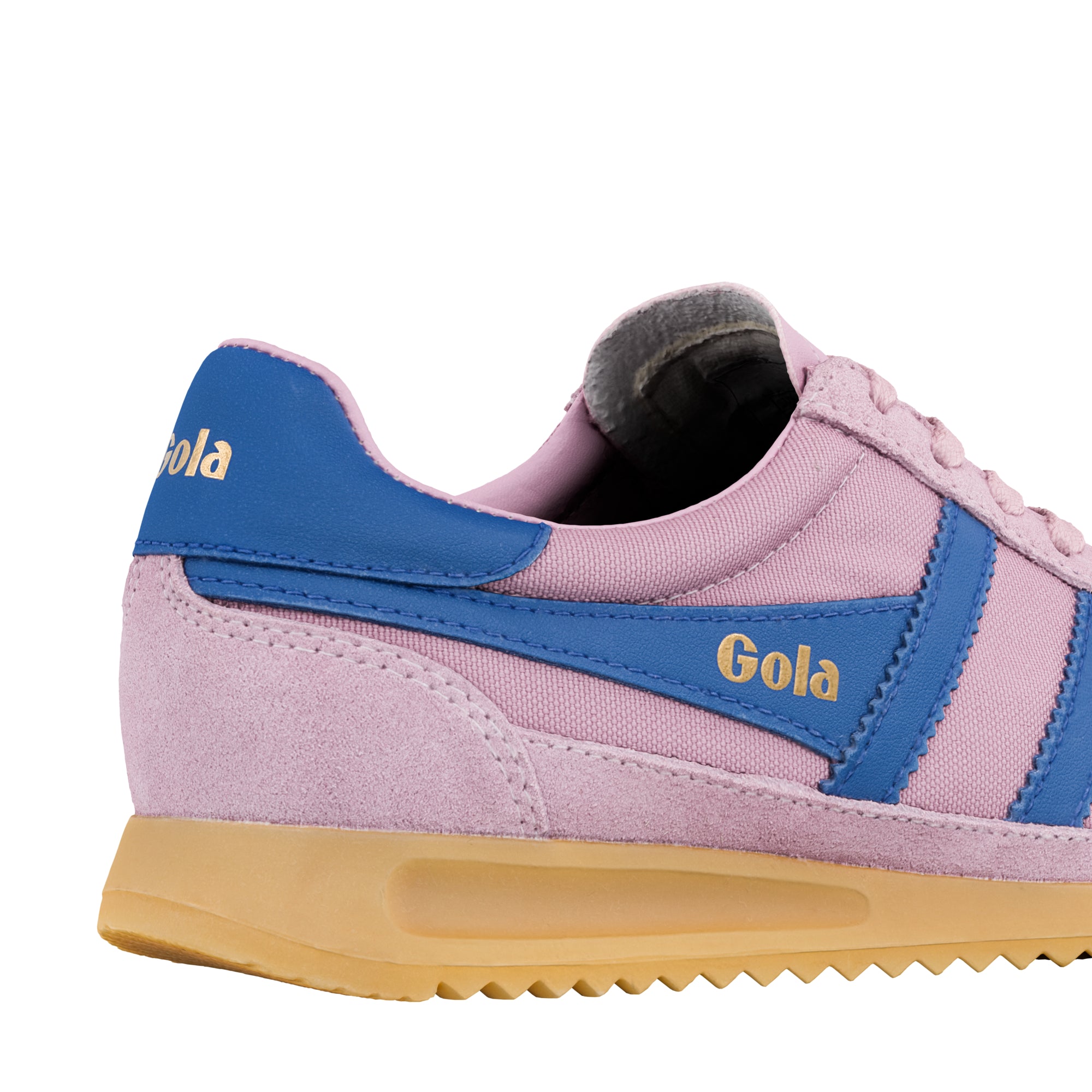 Close up of a pink and blue Gola trainer with a gum sole