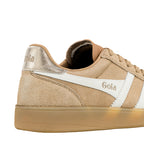 Close up of the heel and side of a beige suede Gola trainer with white trim and a metallic heel tab
