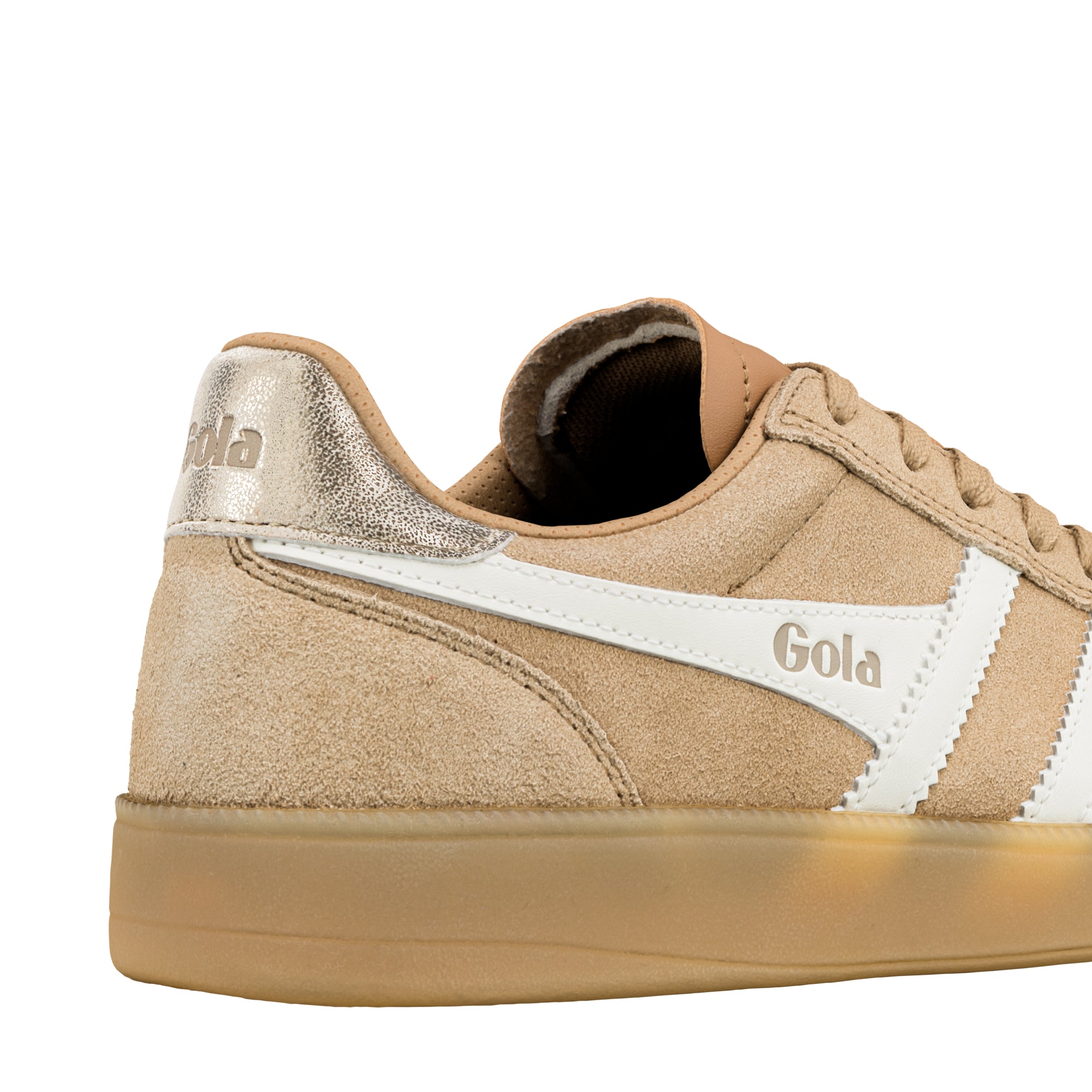 Close up of the heel and side of a beige suede Gola trainer with white trim and a metallic heel tab