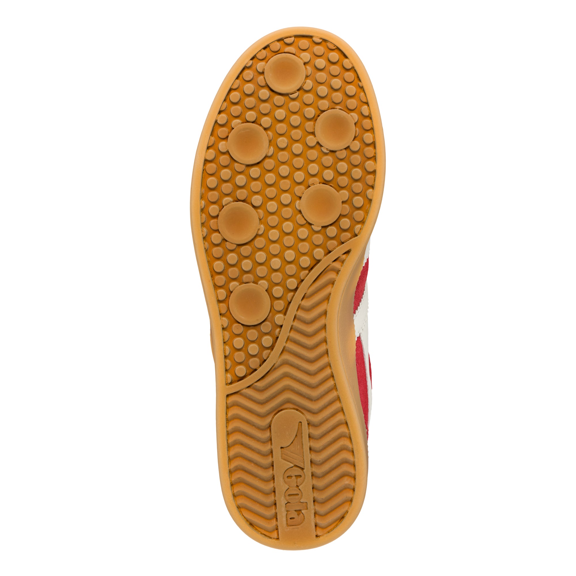 Gum rubber sole of a Gola trainer with circular tread pattern and embossed brand logo