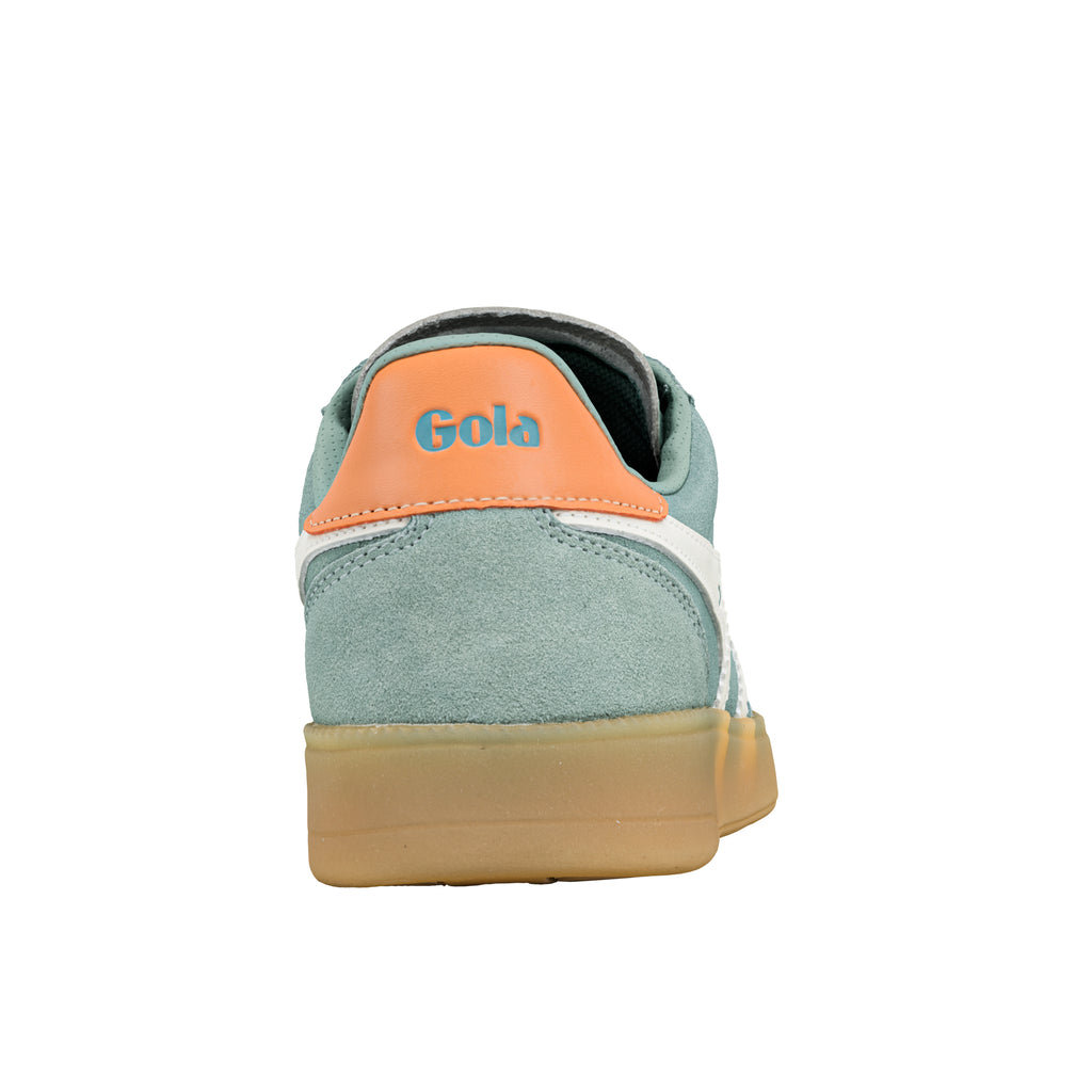 Rear view of a sage green suede Gola trainer with an orange heel tab and gum sole